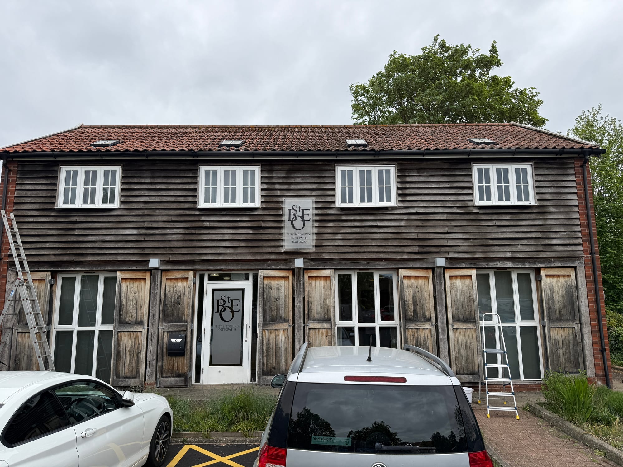 Weathered timber cladding on a commercial building