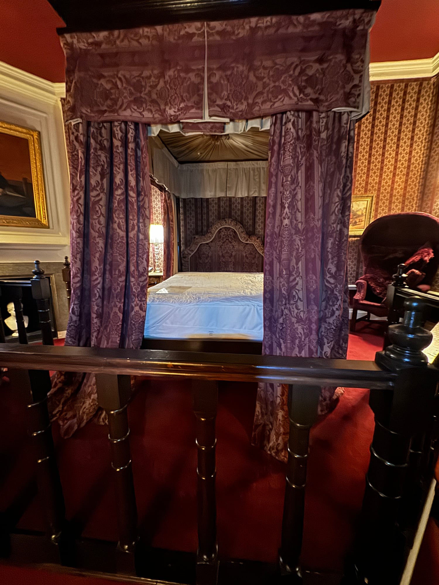 Decorative bed curtains and heritage fabrics inside Lumley Castle
